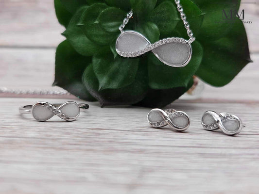 Breastmilk Infinity Ring
Cremation Infinity Ring Keepsake Infinity Ring
 Sterling Silver Infinity Ring
Hair Infinity Ring, Ash Infinity Ring , Umbilical Cord Infinity Ring
BreastmilkJewelry Infinity Rings
